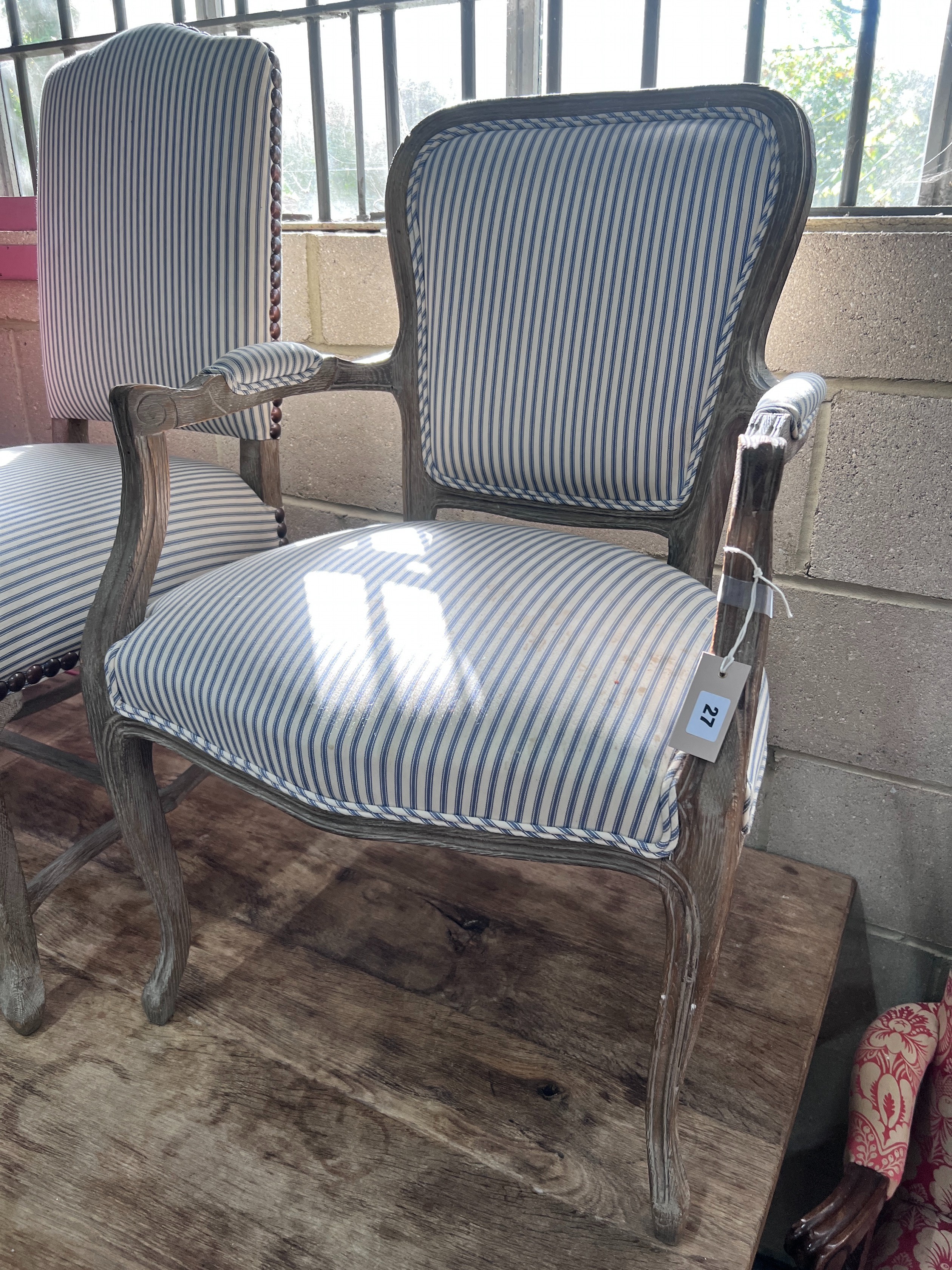 Two French style limed oak chairs, one with arms *Please note the sale commences at 9am.